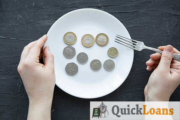 Empty plate with coins